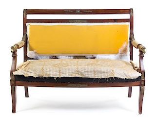 An Empire Style Gilt Bronze Mounted Mahogany Settee Height 14 x width 51 1/4 x depth 22 inches.