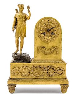 An Empire Gilt Bronze Figural Desk Clock Height 10 7/8 inches.