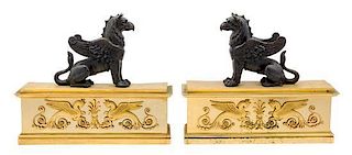 * A Pair of Empire Style Gilt and Patinated Bronze Chenets Width 18 1/4 inches.