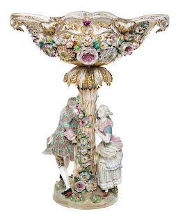 * A Continental Porcelain Figural Centerpiece Height 22 inches.