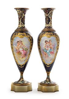 * A Pair of Sevres Style Porcelain, Onyx and Champleve Urns Height 12 3/8 inches.