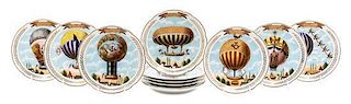 A Set of Twelve French Porcelain Plates Diameter 10 1/2 inches.
