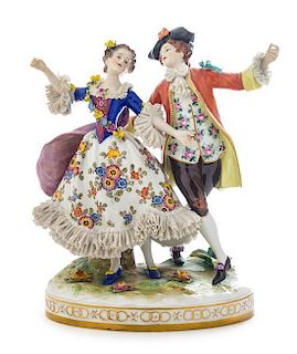 * A Dresden Porcelain Figural Group Height 11 1/2 inches.