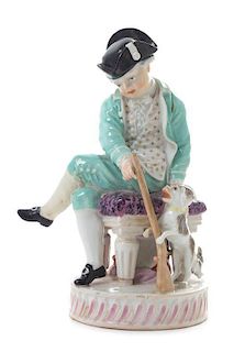 A German Porcelain Figural Group Height 5 5/8 inches.