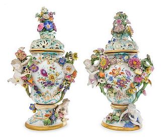 * A Pair of Meissen Porcelain Urns and Covers Height 22 inches