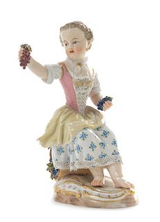 A Meissen Porcelain Figure Height 4 1/2 inches.