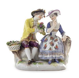A Meissen Porcelain Figural Group Height 4 3/4 inches.