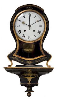 A Continental Gilt and Ebonized Bracket Clock Height 29 1/2 inches.