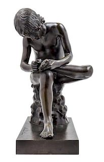 * A Grand Tour Bronze Figure of the Spinario Width 13 inches.
