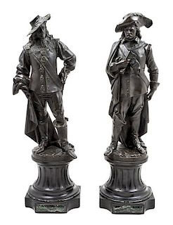 * A Pair of French Bronze Figures Height of tallest 28 1/2 inches.
