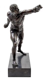 * A German Bronze Figure of an Athlete Height overall 20 1/4 inches.