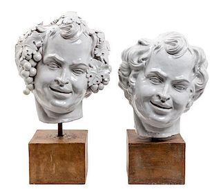 * Two White Glazed Terra Cotta Heads of Bacchus Height of first 16 1/2 inches.