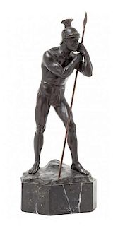 * A Continental Bronze Figure of a Standing Soldier Height 16 1/4 inches.