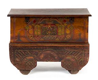 An Indian Carved and Polychromed Marriage Chest Height 37 x width 41 x depth 17 inches.