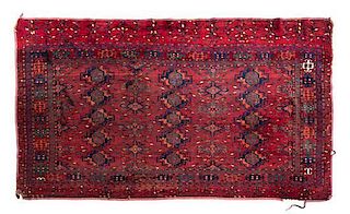 A Bokhara Wool Mat 5 feet 7 inches x 3 feet.