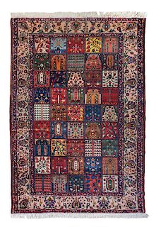 * A Persian Pictorial Wool Rug 9 feet 10 inches x 7 feet 3 inches