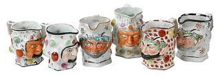 Six Staffordshire Satyr and Bacchus Pottery Jugs
