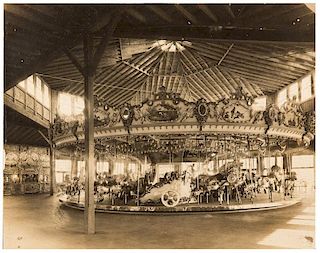 Photographs of Carousel with Cherubic Details.