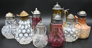 Group of Eight Glass Syrup Pitchers