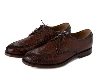 A pair of Gucci men's leather shoes