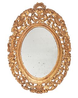 An carved giltwood wall mirror