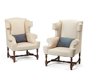 A pair of wingback armchairs