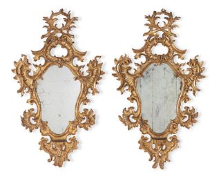 A pair of Northern Italian carved giltwood wall mirrors