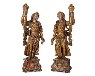 A pair of carved giltwood figures
