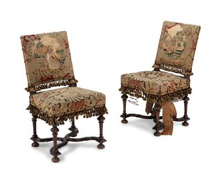 A pair of needlepoint side chairs