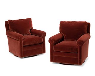 A pair of mohair swivel armchairs