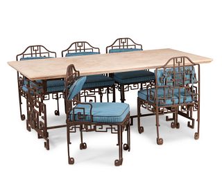 A Chinoiserie-style cast iron outdoor garden dining set