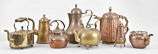 A lot of eight hand made brass and copper beverage pots
