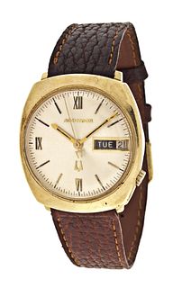 A gold Bulova Accutron wrist watch