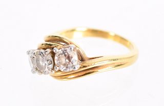 An 18k Gold and Diamond Ring