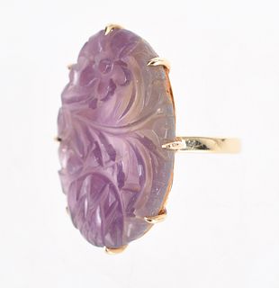 A 14k Gold and Carved Amethyst Ring