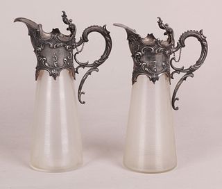 A Pair of Victorian Glass and Silver Plated Ewers