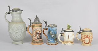 Five German stoneware steins; Mettlach and others