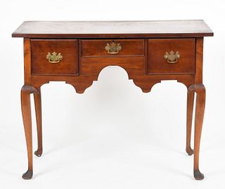 A Queen Anne cherry and mahogany dressing table