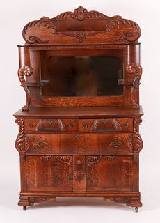 A late Victorian carved oak buffet, 19th century