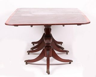A Three Pedestal Dining Table