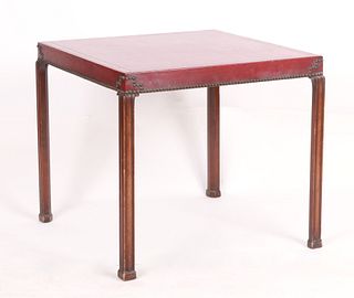 George III style leather and mahogany games table