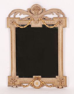 A Neoclassical style parcel gilt and painted mirror