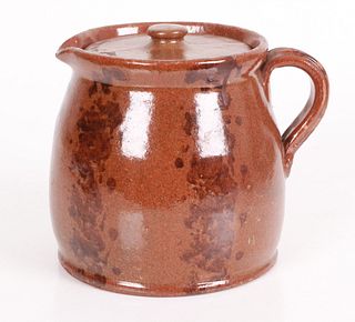 An American lead glazed redware bean pot