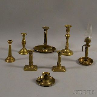 Eight Brass Candlesticks
