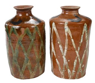 Two Amber Glazed Wine Vessels