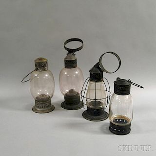 Four Tin and Glass Globe Lanterns