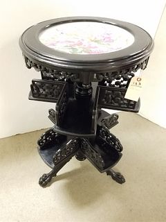19TH C EBONIZED 2 TIER REVOLVING BOOK STAND W/ INSET PORCELAIN CHARGER ON TOP 32"H X 18" DIAM CORDTS MANSION
