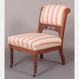 A Victorian Walnut Upholstered Slipper Chair, 20th Century.