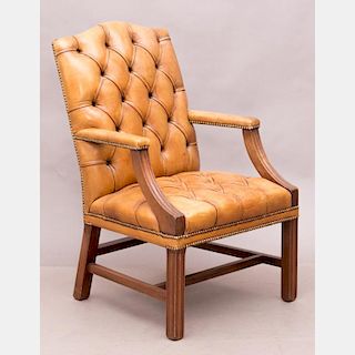 A Georgian Style Mahogany and Tuft Upholstered Armchair, 20th Century.