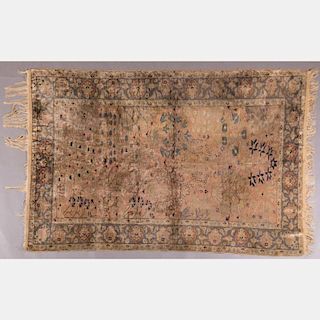 A Persian Silk Rug, 20th Century.